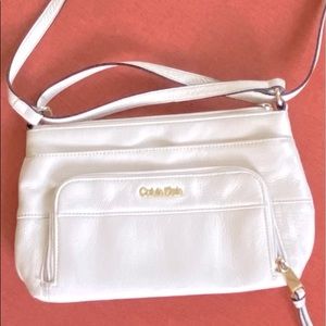 Calvin Klein cream crossbody purse